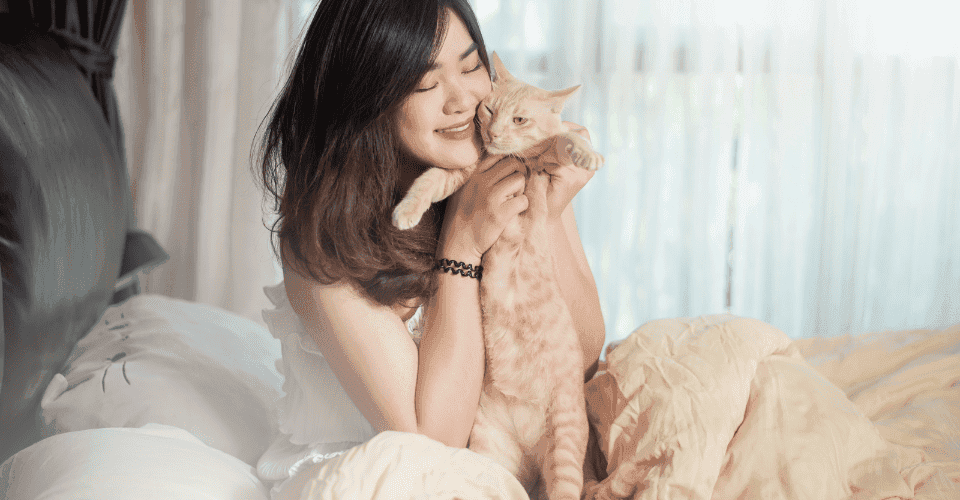 Woman playing with Cat